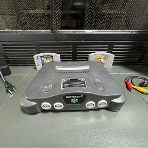 NINTENDO 64! Including: the cords, mario kart 64, rampage 2, the actual nintendo